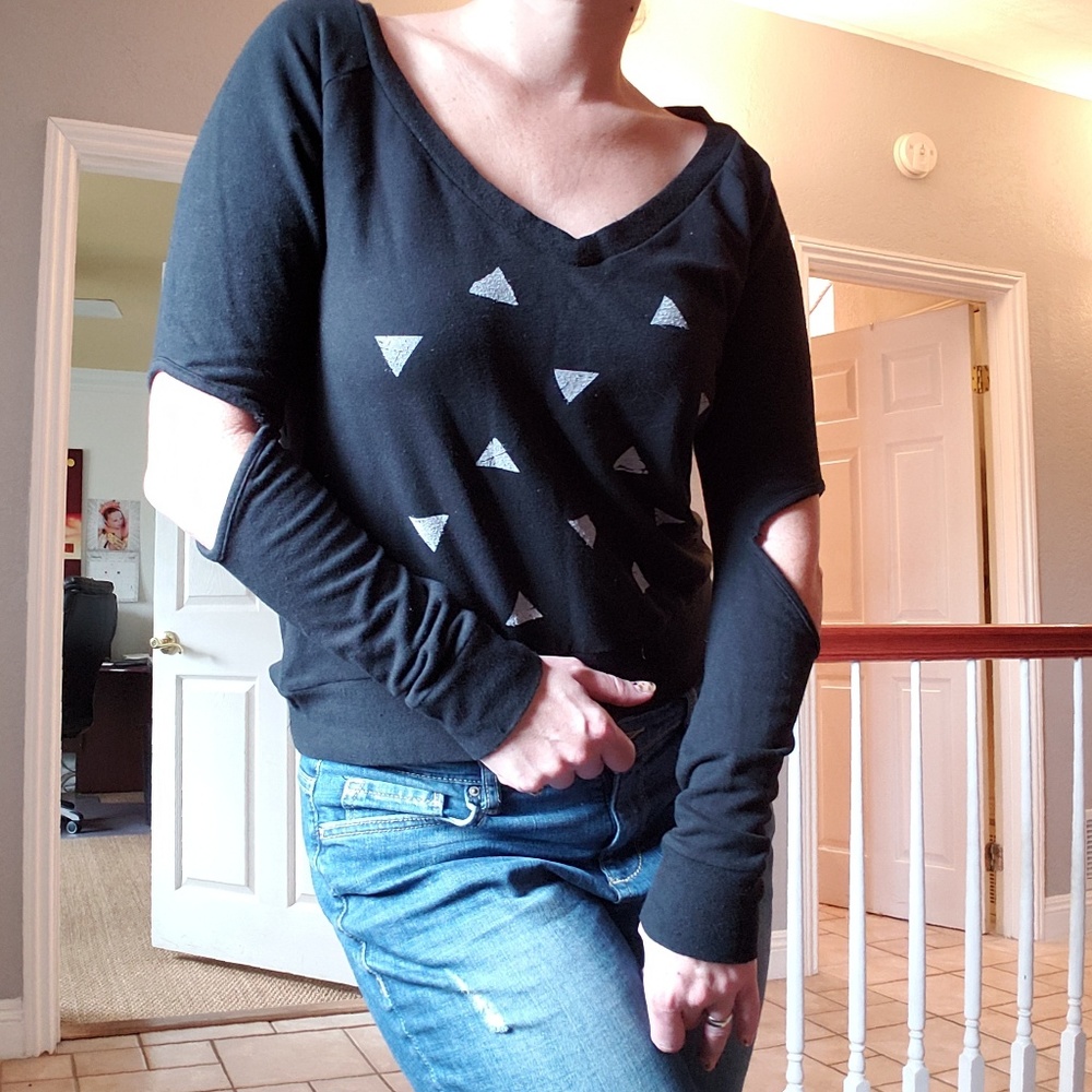 Unique and Edgy jersey sweater with elbow cutout